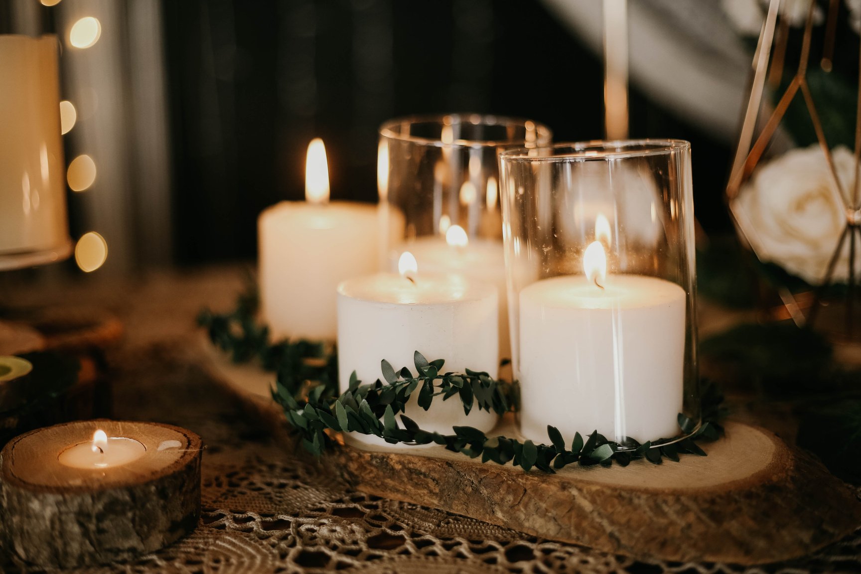 White Candles on Brown Wooden Table